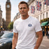 Man in London standing next to Aston Martin wearing JAMES BOND T-Shirt