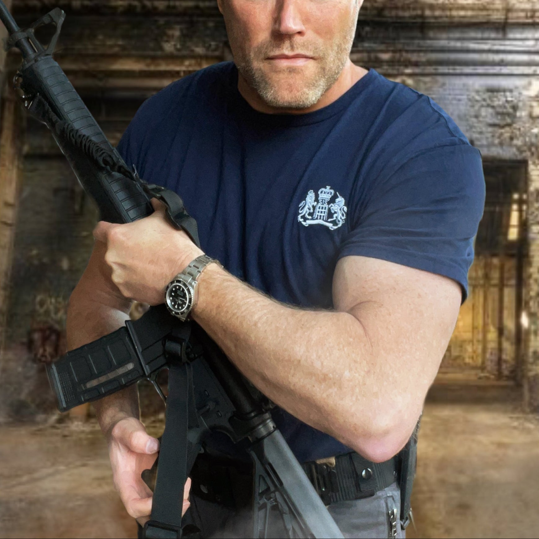 Man holding a rifle in an urban setting with a blurred background wearing a James Bond T-Shirt