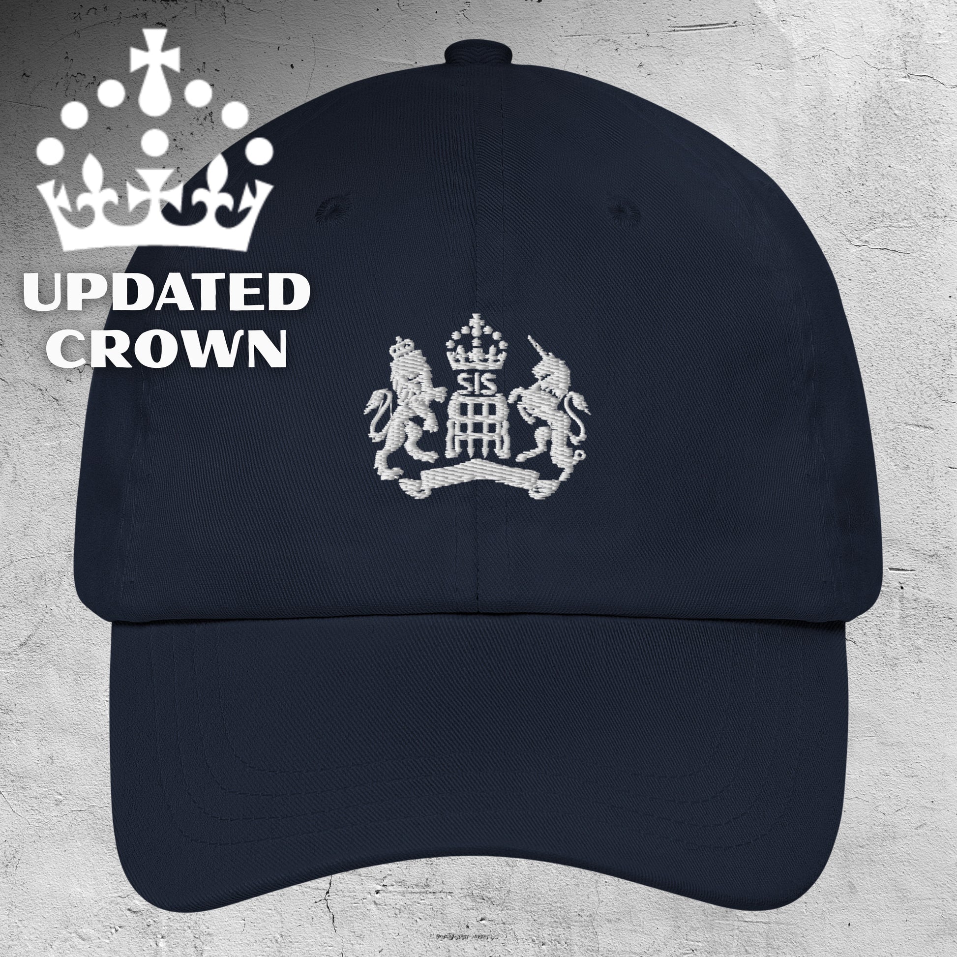 Navy cap with white emblem and 'Updated UK Kings Crown' text on a light gray background