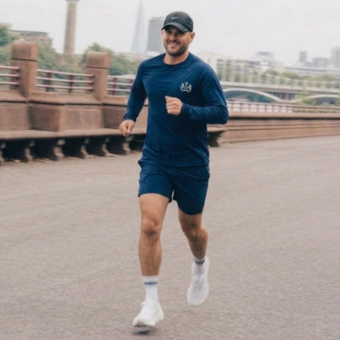 Man running in london wearing James Bond Skyfall long sleeve shirt